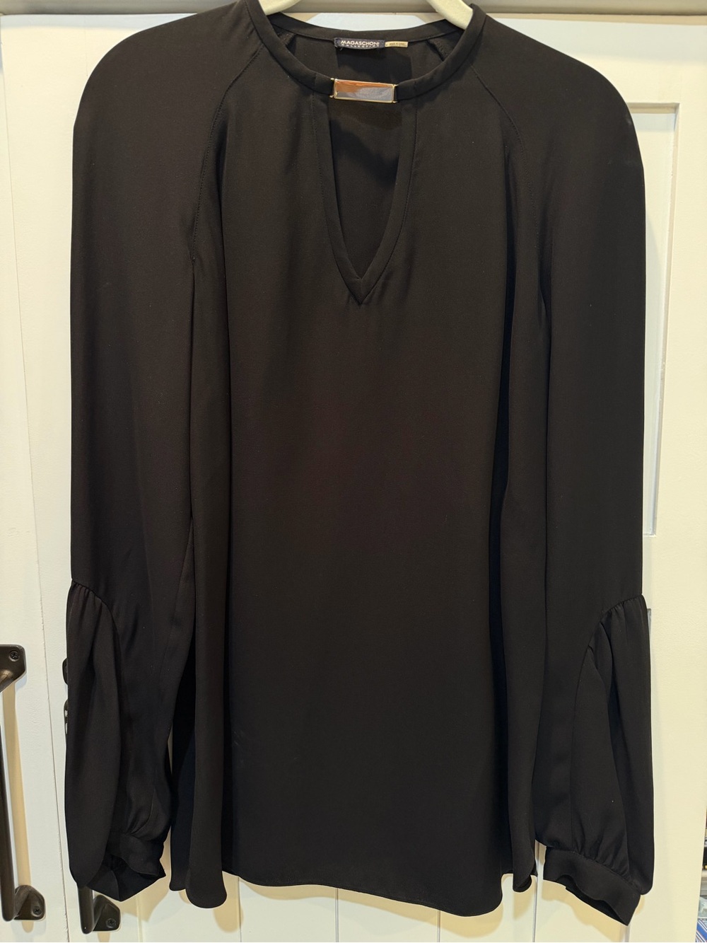 Magaschoni Black Keyhole Blouse w/ Gold Bar
Size 6, LIKE NEW, Beautiful sleeves!